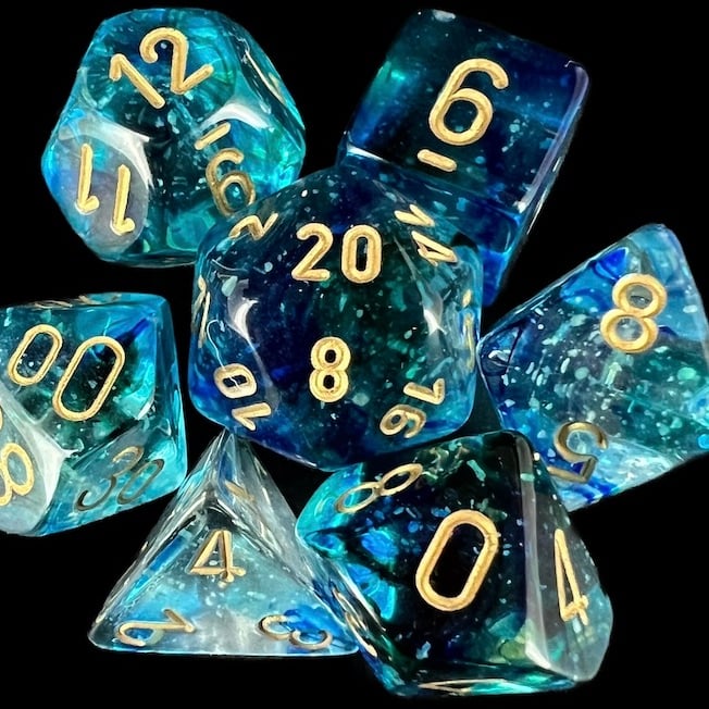 Chessex Nebula Oceanic & Gold Luminary Glow In Dark Dice