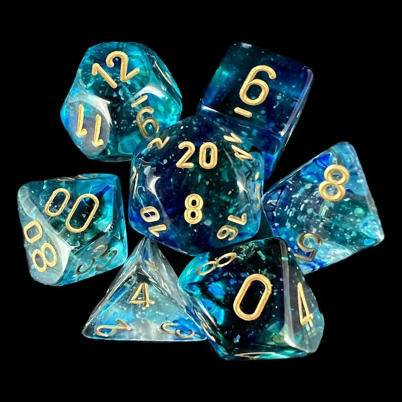 Chessex Nebula Oceanic & Gold Luminary Glow In Dark 7 Dice Polyset